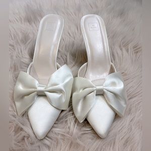 David’s Bridal Ivory Satin Bow Heeled Mules